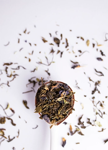 Herbal blue pea cardamom tea powder mix made by certified tea manufacturer and supplier in India.